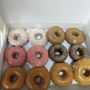 a dozen donuts in a box