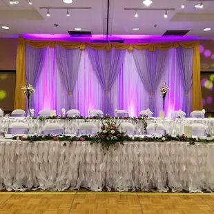Head table with tall backdrop