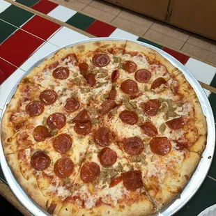 Large pepperoni and sausage pizza