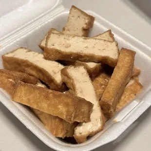 a takeout container of food