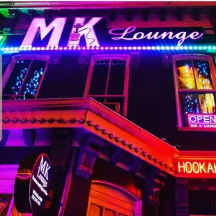 the neon sign of the restaurant