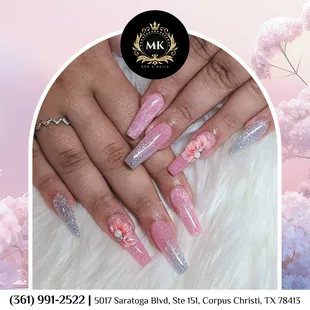 Spring blooms on your fingertips! 
Let your nails blossom with pink floral designs.
