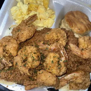 Breakfast! I got catfish, shrimp, cheese grits, eggs and a honey buttered biscuit!