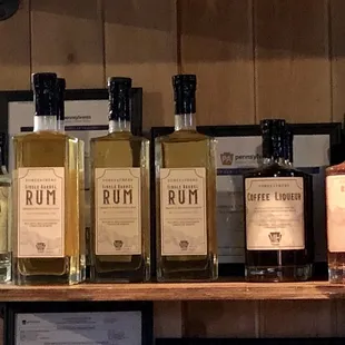 a row of bottles of rum
