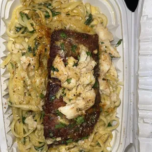 Chef's special salmon topped with crab meat and some kind of Alfredo lemon sauce