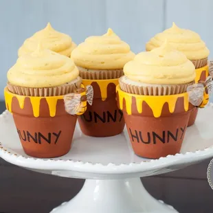 Custom Hunny Pot cupcakes.