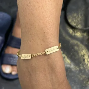 Custom laser engraved anklet with her grand babies names