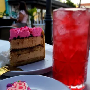 a slice of cake and a drink