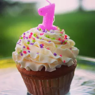 Large cupcake is perfect for a smash cake or  for cutting into at your wedding