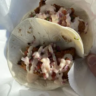 Deep Fried Cod Fish, served as a Taco in a Flour Soft shell!