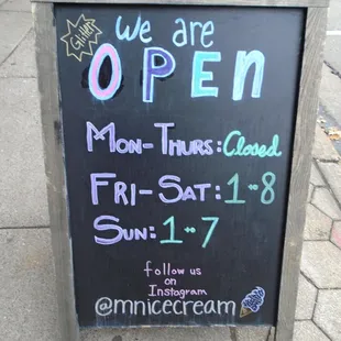 Sandwich sign on the sidewalk - open!