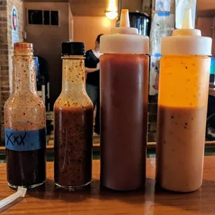 Bbq sauces! Left to right, XXX Ghost Pepper sauce, Hot sauce, Sweet sauce, Carolina mustard