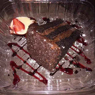 a piece of chocolate cake with strawberries