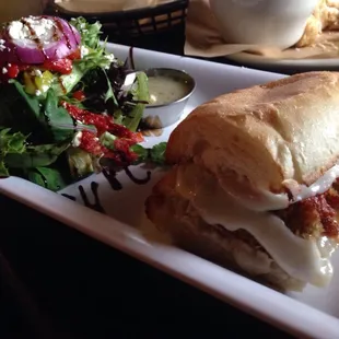 Eggplant sandwich(1/2) with Greek side salad for vegetarian option in Midlothian.