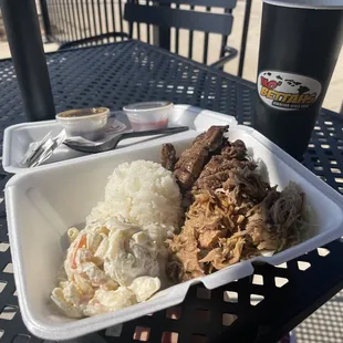 Mini plate with teriyaki steak, pulled pork, white rice, and macaroni salad. 3/4/23