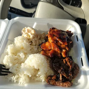 2 meat meal, teriyaki chicken and steak with side of white rice and macaroni salad.