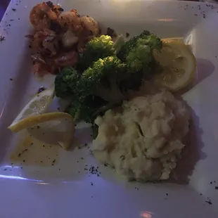 Shrimp with garlic mashed potatoes and broccoli