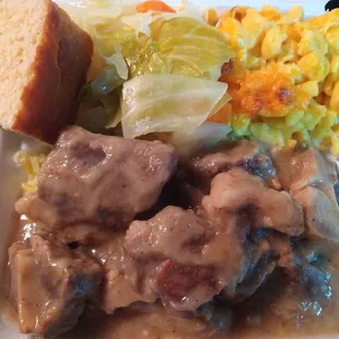 Oxtails and Rice, Macaroni and Cheese, Cabbage, Cornbread