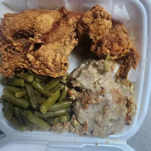 Fried chicken, green beans, and dressing. Nice portions, decent food, but salty