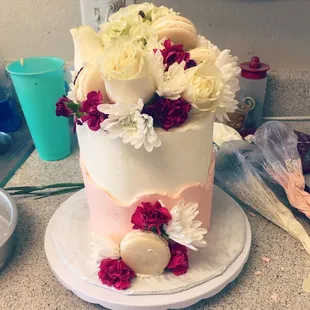 6" Designer Cake with Macaroons and fresh flowers.