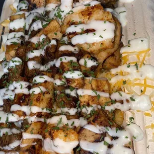Steak Shrimp and Grilled Chicken cheese fries with Ranch