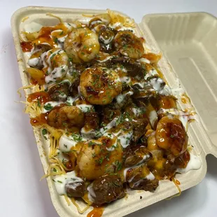 Shrimp and steak mango habanero fries