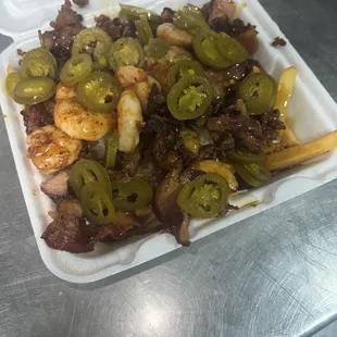 Shrimp bacon cheese fries with jalapeño cheese and Honey Garlic