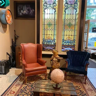 a living room with stained glass windows