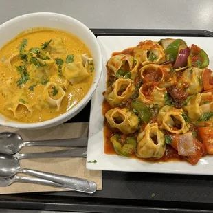 a plate of pasta and a bowl of soup