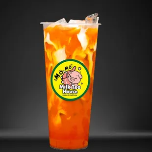 a glass of iced tea with ice
