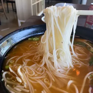 Large Chicken Pho with condiments and Siracha
