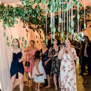 Seating chart idea! We put guest names and seat on leaves arranged in alphabetical order. Genius!!!