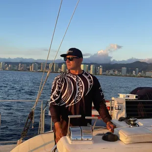 Captain Johnny at the Helm