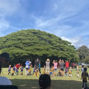 After the game parents made a tunnel for the kids.