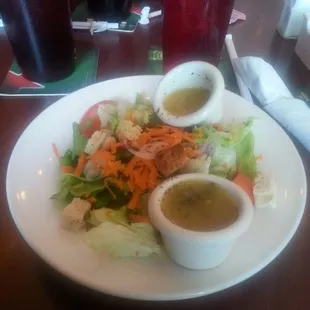 House salad with orange vinaigrette dressing.