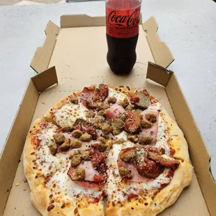 Best Pizza in Town with Beer in the Dough! Ham, Sausage, &amp; Meatball with a Coke Zero!