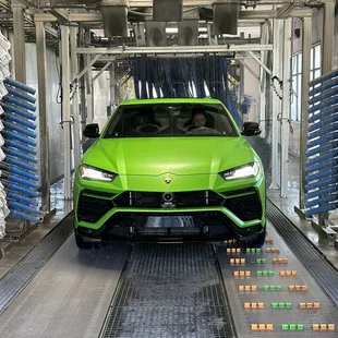 Lamborghini Urus using the car wash