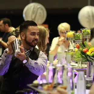 David Eclevia shaking up some samples for nearly 1,400 guests at the Center of Human Services&apos; Edible Extravaganza. &quot;Eat, Drink, Do Good.&quot;