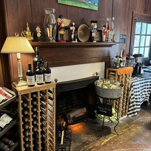 a fireplace and wine rack