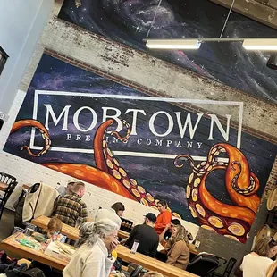 a group of people sitting at tables