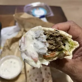 Gyro sandwich with some cucumber sauce