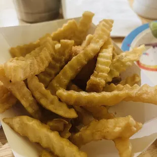 a basket of fried fries