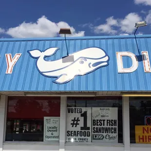 Window advert.s fried green tomatoes &amp; that it's owned by a local