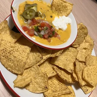 Store bought chips and their "queso".
