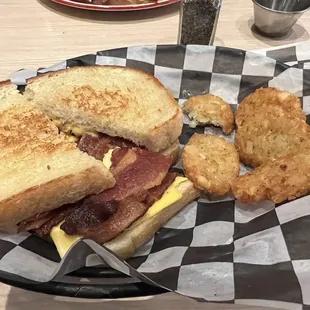 Grilled cheese with bacon and hash rounds (or they say tater tots)