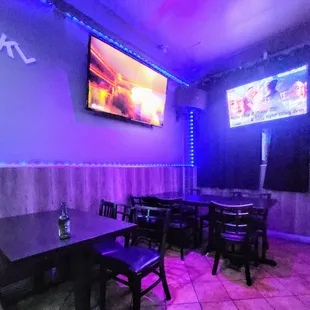 Karaoke TVs surrounding...