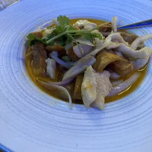 Yellow Curry with chicken minus bell peppers on request. Side of white rice not pictured