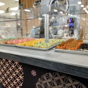 (from right to left) Oreo, Thai tea, honeydew, mango, I forgot the pink one and the one next to it, cotton candy, ube