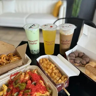 Honeydew MT, peach tea, Vietnamese coffee, mochi donuts, hot cheetos loaded fries, curly fries, potato corn dog