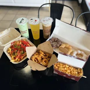 Honeydew MT, peach tea, Vietnamese coffee, mochi donuts, hot cheetos loaded fries, curly fries, potato corn dog